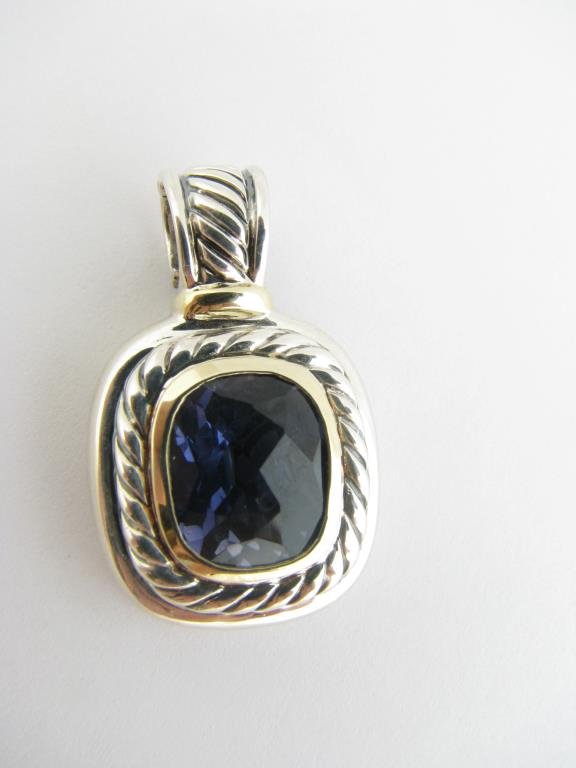 Sterling/14k Gold David Yurman Albion Pendant: Sterling silver and 14k gold David Yurman albion pendant in iolite, overall measurements approximately 1.25" x .75" with .5" square stone, very small chip on stone visible by jeweler's loupe, retail $