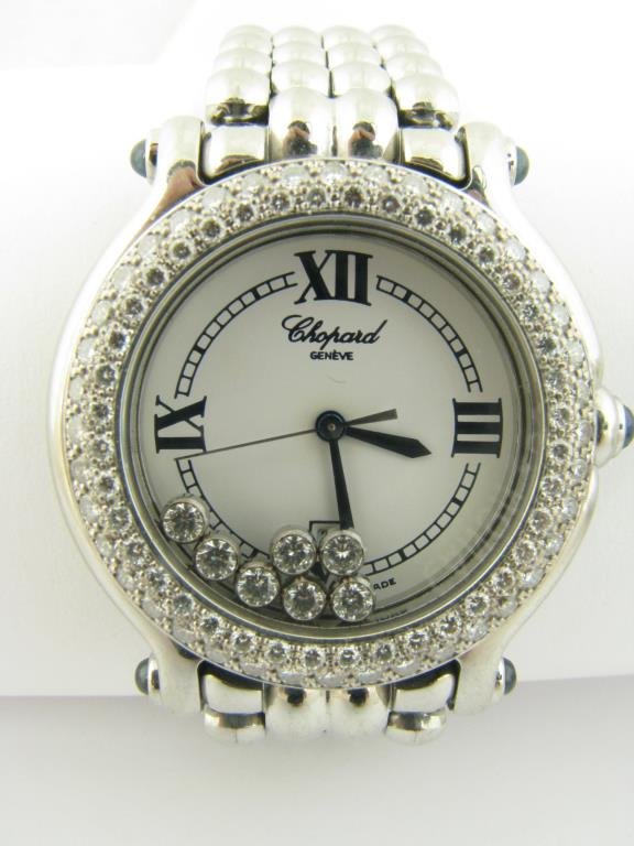 Chopard Happy Sport, Diamond Bezek and 7 Diamonds: Lady's Chopard happy sport with diamond bezel and 7 happy diamonds, quartz movement, retail $20,000 210307