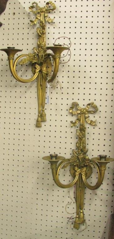 Set of Four Antique French Style Wall Sconces: A set of four antique French style wall sconces, French horn and leaf motif, 23" high, cast metal