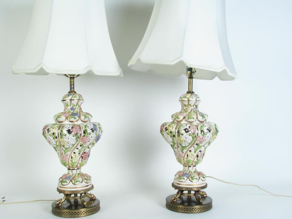 Pair of Capodimonte Lamps: A pair of Capodimonte lamps with brass fish motif bases, marked Made in Italy, 36" tall to finial