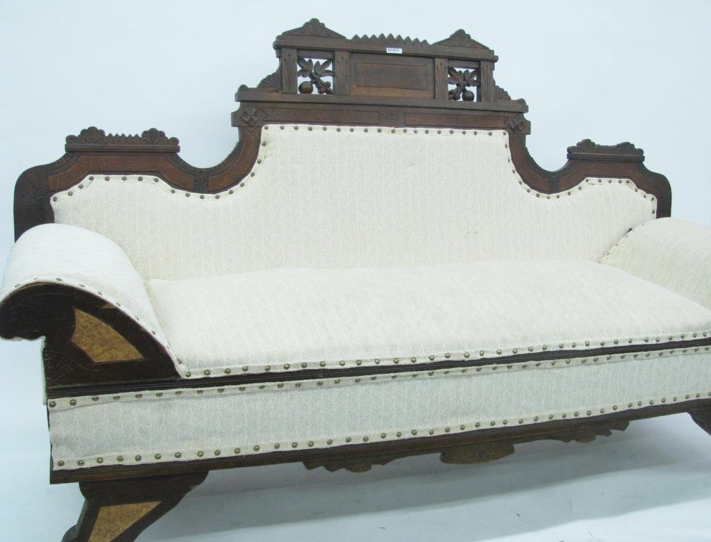 Eastlake Sofa/Early Hide-a-Bed: An Eastlake sofa/Early Hide-a-bed with fruit and leaf carvings with modern upholstery