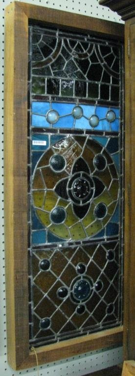Antique Stained Glass Window: An antique stained glass window including several textured beads, minor damage only, frame measures 19" x 43"