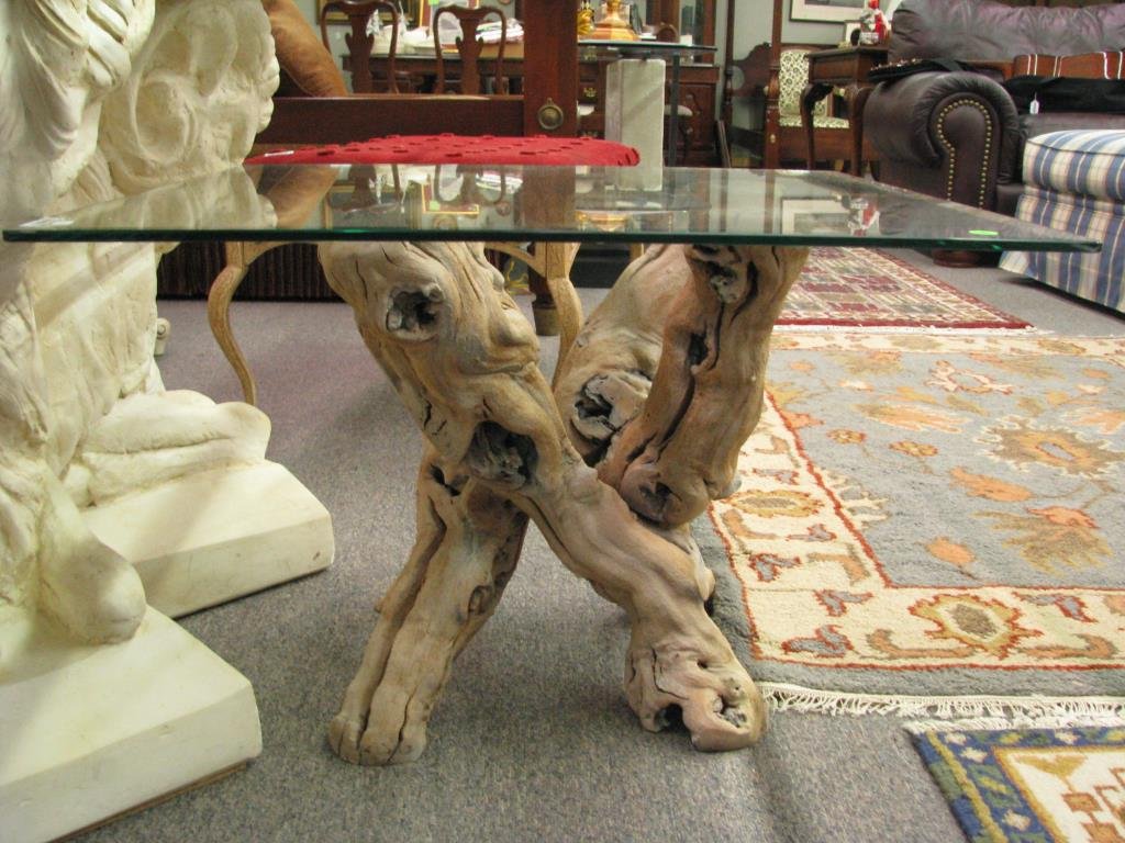 Glass Top End Table with Driftwood Base: A glass top end table with driftwood base, 19" high x 28" square