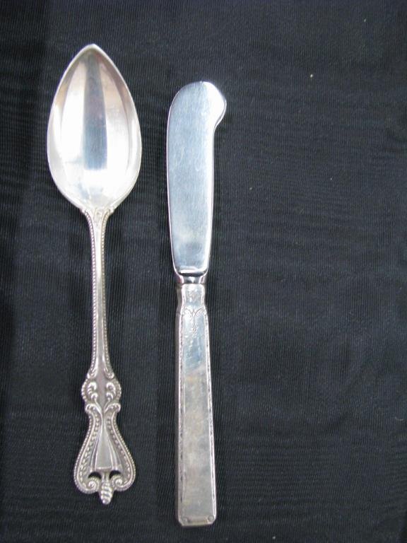Group of Sterling Silver Flatware: Group of sterling silver flatware including four butter knives with sterling handles, set of six teaspoons, set of six teaspoons with ribbed bowl and 17 teaspoons with ribbed bowl (monogrammed)"