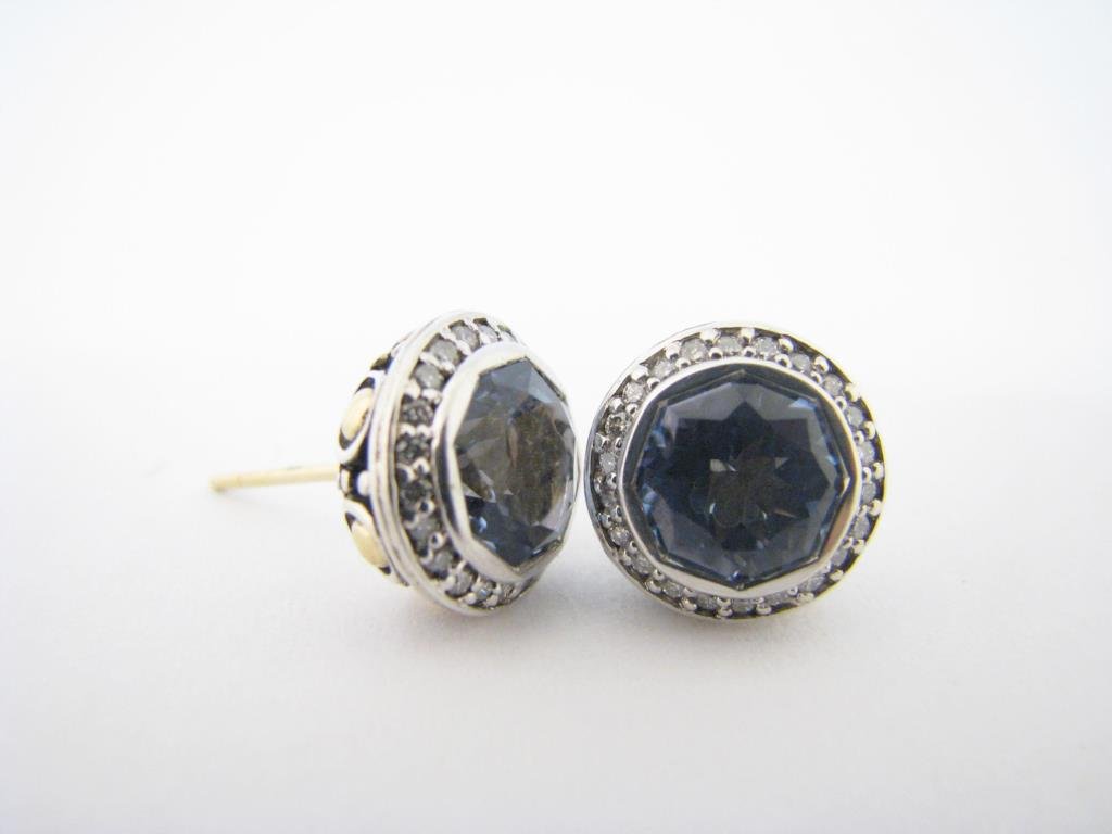 John Hardy Sterling/18K Topaz, Diamond Earrings: A pair of John Hardy sterling and 18K yellow gold earrings from the Batu Sari collection, each with light blue faceted topaz, surrounded by round pave diamonds