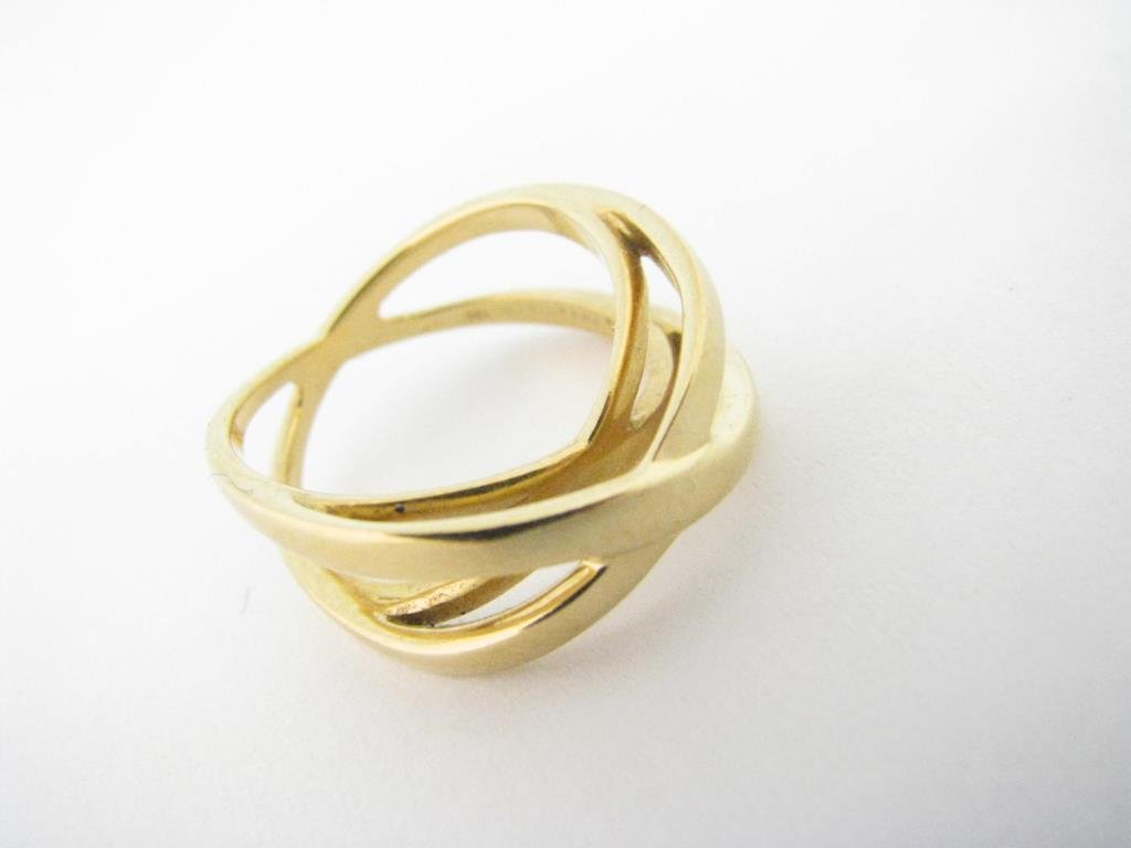 18K Tiffany & Co. Criss-Cross Ring: An 18K yellow gold Tiffany & Co. criss-cross ring, size 6.75, 4.3dwt