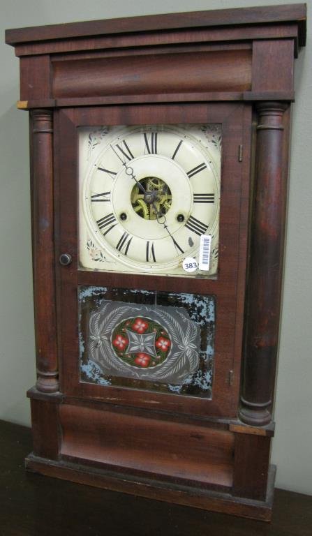 Seth Thomas Ogee Mantle Clock: A Seth Thomas Ogee mantle clock with reverse painted decoration on glass door, some veneer missing