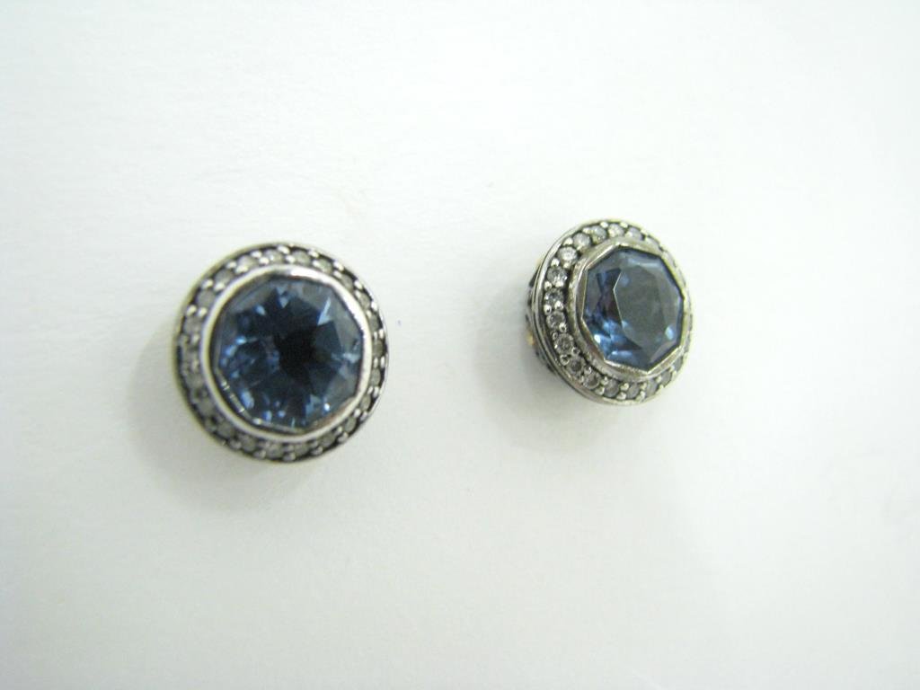 John Hardy "Batu" Sterling/18K Blue Topaz, Diamond: John Hardy "Batu" collection sterling silver, 18K yellow gold, blue topaz and diamond earrings. The earrings are 11.5 in diameter. Set in each is one round faceted blue topaz. The outer border is pave