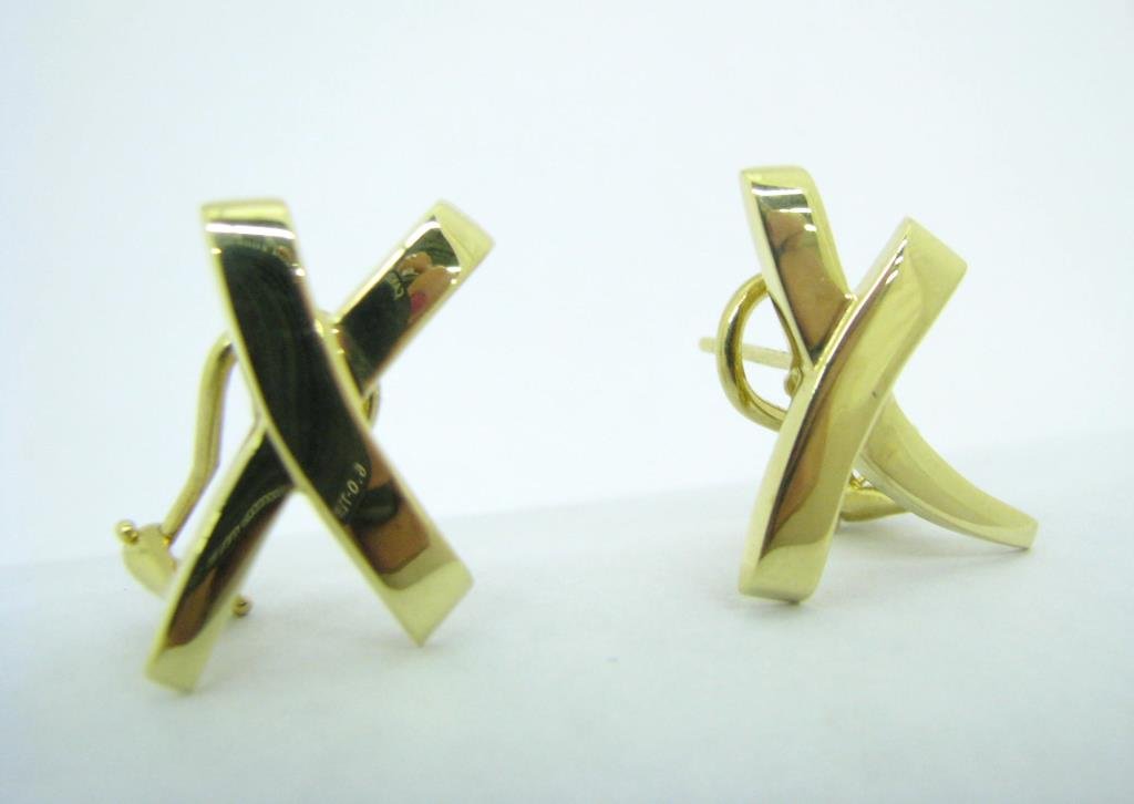 Tiffany 18K Paloma Picasso "X" Earrings: Tiffany & Co. 18K yellow gold Paloma Picasso "X" design earrings. They are 20 mm x 17 mm in size with omega style backs. Stamped Tiffany & Co. 750 Paloma Picasso in Tiffany felt bag