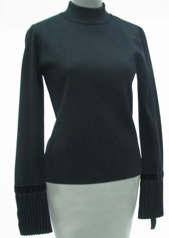 Votre Nom Collection Sweater: Votre Nom Collection black long sleeve mock t-neck sweater. Sleeve cuffs are pleated bell design and trimmed with velvet ribbon tie. Size Medium