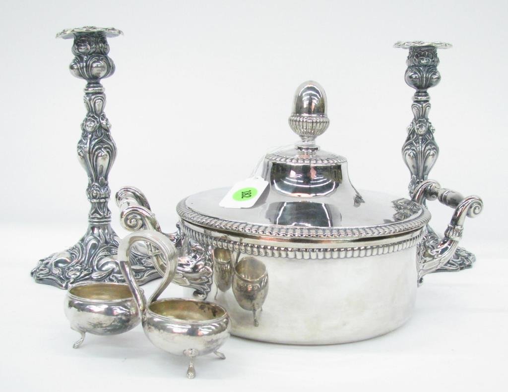 Group of Silver Plate: Group of silver plate including a pair of Apollo candlesticks, a handled double master salt, and a lidded handle casserole with ceramic liner