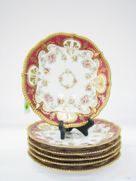 Set of Six Limoges Plates: A set of six Limoges plates, 9.5", with floral and gold enamel decor, 20th century, with red ink Limoges stamp and blue ink Elite France stamp, some gold paint rub