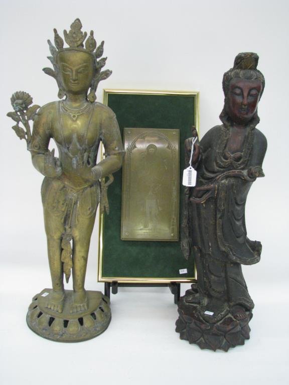 Group of Religious Icons: Group of religious icons including 27" wood carving of religious figure; a 30" spelter figure of Thai mythical figure, selling with 9" high carved stand; and brass plaque depicting Sir John D'Aubernou