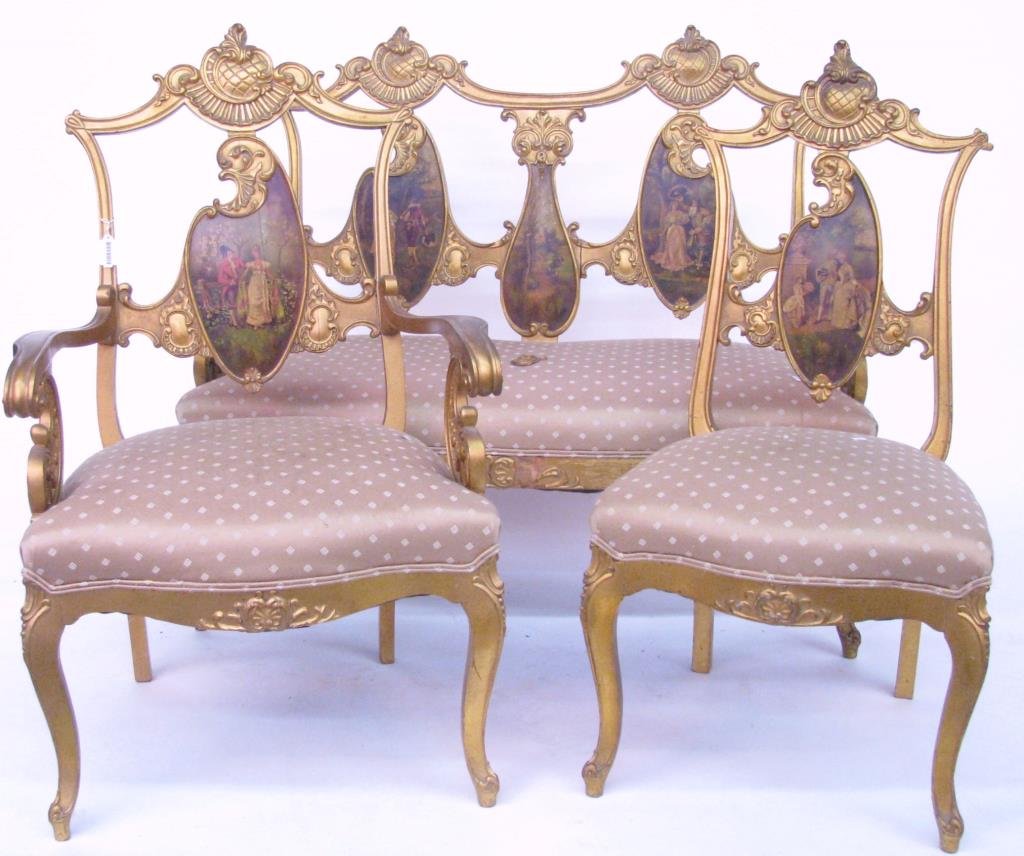 Three Piece Parlor Set and Table: A three piece parlor set, French transitional style, including settee, host and hostess chairs, all with carved frames having scenic panel inserts and padded upholstered seats (worn finish and upholst