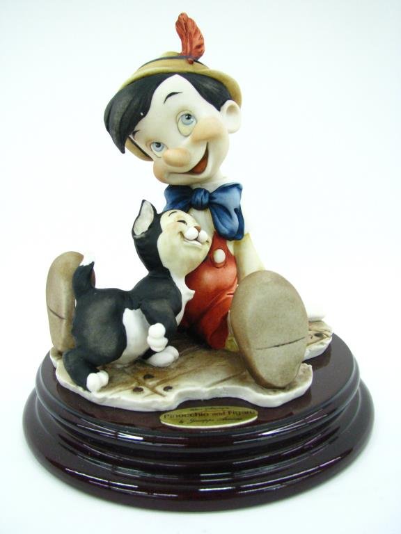G Armani Disney Sculpture, "Pinocchio and Figaro": Giuseppe Armani Walt Disney sculpture, "Pinocchio and Figaro", 0464C, with original box
