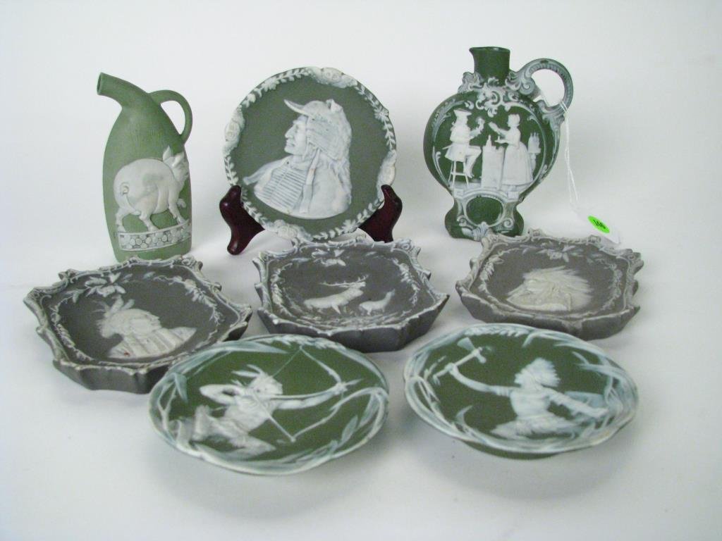 Group of Green and White Wedgwood and Jasperware: A group of green and white Wedgwood and Jasperware including five pieces with Native American portraits; 5" handled ewer; bottle with pig decoration; and plaque with deer decoration