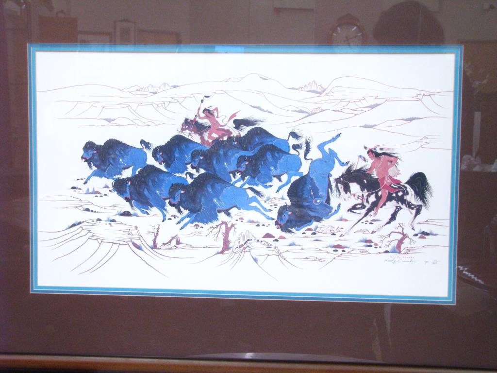 Woody Crumbo Framed Silk Screen Print: Woody Crumbo Framed Silk Screen Print, depicting the Blue Buffalo Hunt, signed and numbered in pencil lower margin 207/950, size as framed is 30" x 42"