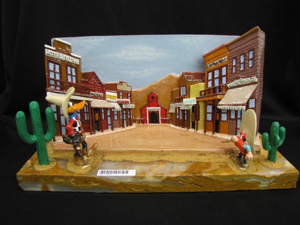 Ron Lee Warner Bros Sculpture Daffy & Yosemite Sam: Ron Lee Warner Brothers sculpture, depicting Daffy and Yosemite Sam in Old West shoot out, with alabaster base and painted cast metal figures, personalized and signed, copyright 2004, Artist Proof 7/2