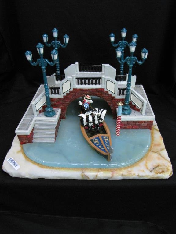 Ron Lee Warner Brothers Sculpture, Pepe LePew: Ron Lee sculpture, Pepe LePew and girlfriend on gondola piloted by Sylvester the cat, on alabaster base, with cast metal figures, signed, dated and personalized 2000, AP 6/50, 14.5" x 15.5" 11" high