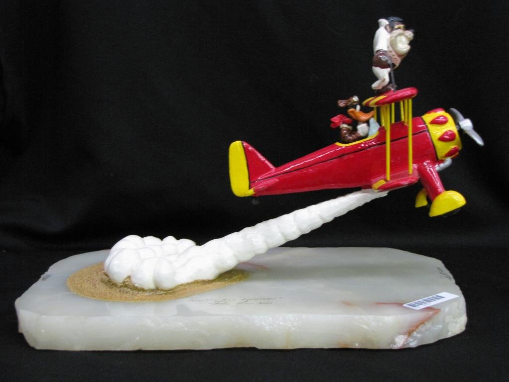 Ron Lee Warner Brothers Sculpture, Daffy & Taz: Ron Lee Warner Brothers sculpture, depicting Daffy Duck and Tasmanian Devil on biplane, on alabaster base, with cast metal figures, signed, dated and personalized 2001, 38/500, 12" x 7.5" x 8" high