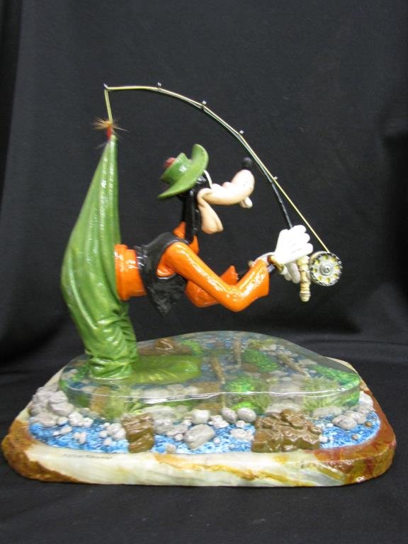 Ron Lee Warner Brothers Sculpture, Fishing Goofy: Ron Lee Warner Brothers sculpture, depicting Goofy fishing, on alabaster base, with cast metal figures, signed, dated and personalized 2004, 30/950, 12" x 9.5" x 11.5" high
