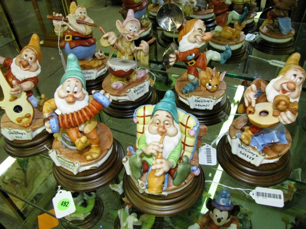 Capodimonte Laurenz Seven Dwarves by Enzo Arzenton: Capodimonte Laurenz Dwarves by Enzo Arzenton, including "Doc", LZD-55, serial #2822; "Happy", LZD-60, serial #2816; and "Bashful" LZD-58, serial #2784; "Dopey", LZD-54, serial #3153; "Grumpy", LZD-59,