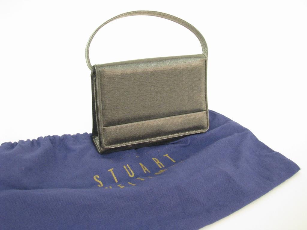 Stuart Weitzman Pewter Metallic Handbag: Stuart Weitzman pewter metallic lame delicate handbag. Adjustable/removable top handle, flap front with snap closure. Interior lined with logo design and one interior side pocket. Includes dust bag. 4
