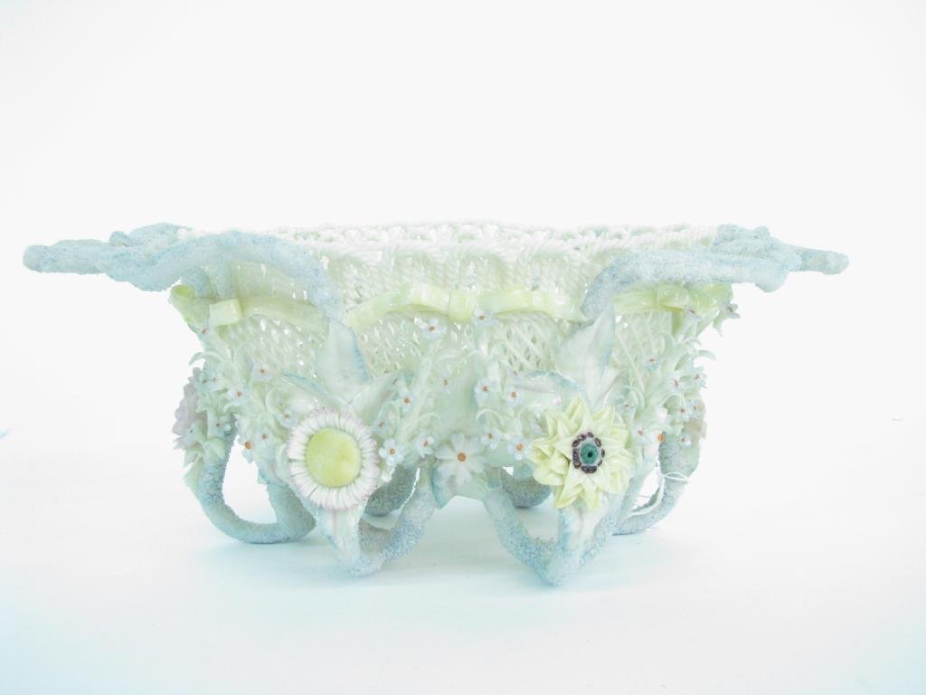 Irish Belleek Rathmore Porcelain Basket: Fine and rare Irish Belleek oval Rathmore painted basket, four strands with two pads marked Belleek R, CO. Fermanagh, pottery #587; 12 inch length; 5 inch height, no damage noted on visual inspection,