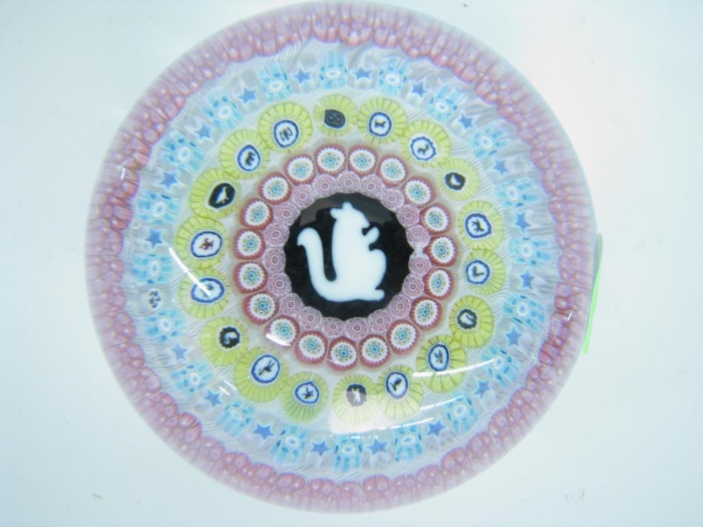 Baccarat Gridel Squirrel, Millefiori: Baccarat 1972 Gridel squirrel and concentric millefiori paperweight, with a large central white squirrel silhouette cane is encircled by several concentric rings of assorted complex canes, including o