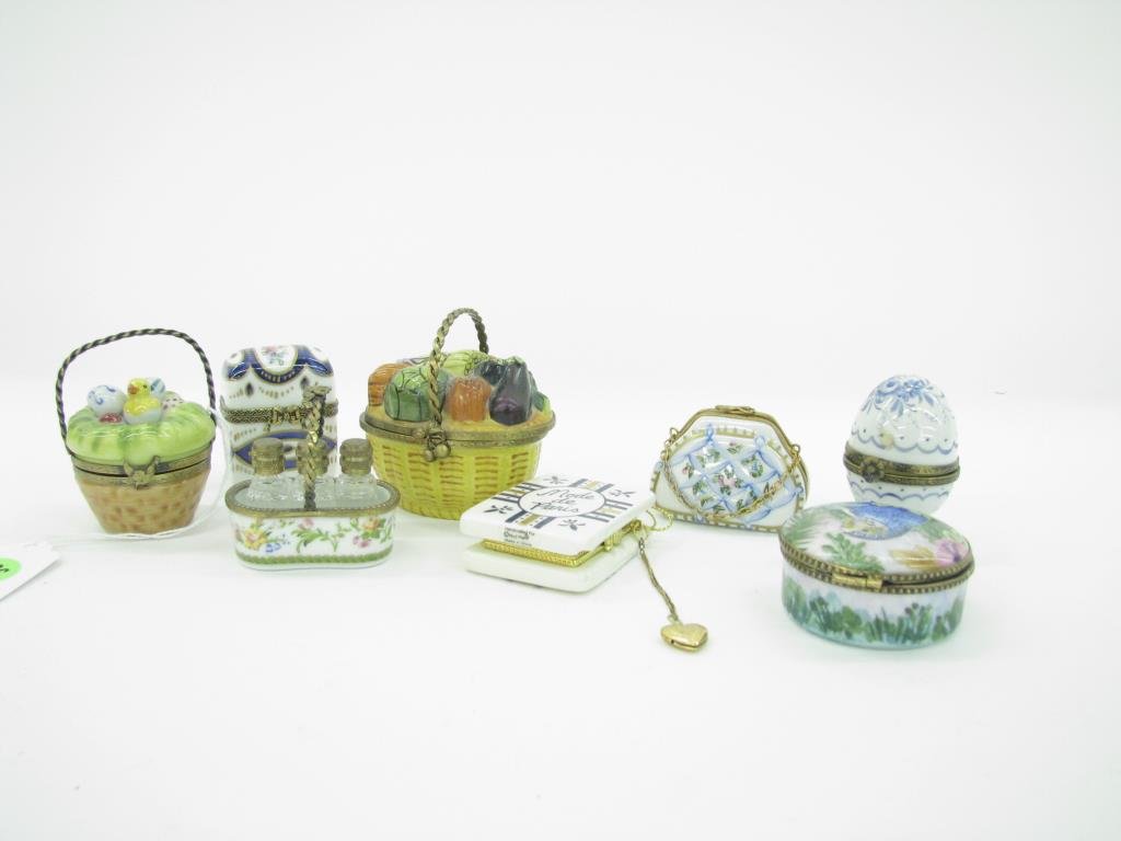 Group of Limoges Porcelain Boxes: A group of eight, French porcelain Limoges boxes, including two small perfume caddies, all hand decorated in various styles