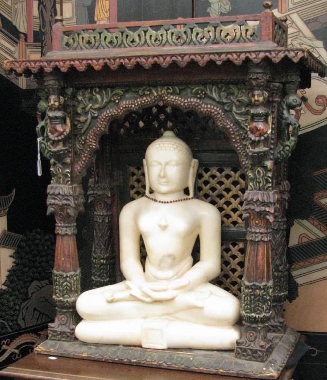 Antique Sino-Tibetan Marble Figure with Altar: An antique Sino-Tibetan marble figure of Buddha, 22" high, with a carved and paint-decorated wooden altar for display