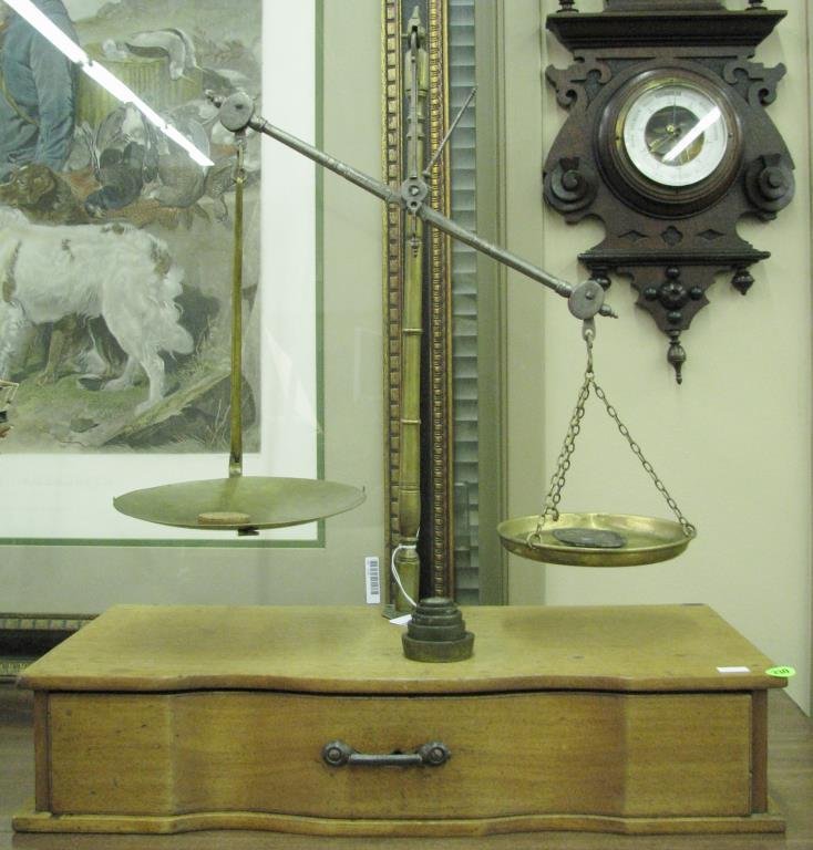 Antique Brass Beam Scale: Antique brass beam scale, with one-drawer base, 23" high, made by James Pickering Doblin, also bears label inside from Hyde Drugs and Medicine of Marshall, Michigan, includes several weights