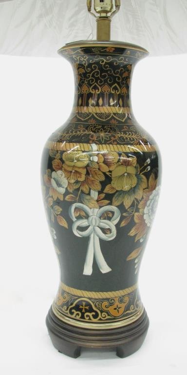 Oriental Style Decorator Table Lamp: An Oriental style decorator table lamp, approximately 3' high, dark green with floral decor, with Frederick Cooper silk shade
