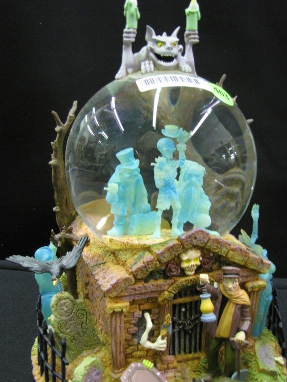 Group of Three Snow Globes: Group of three snow globes, including Boyd's Bears Winnie the Pooh, The Gambler, and Grim Grinning Ghosts