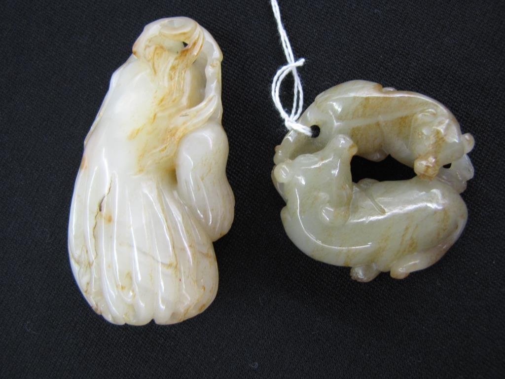 Two Chinese Jade Carvings: Two Chinese jade carvings including gray jade, approximately 2" x 2.25" depicting animals and rest and decorative carved white jade item measuring 3.5" x 2"