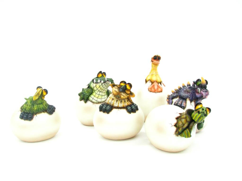Todd Warner Hatchling Series Sculptures: Group of Todd Warner Hatchling Series sculptures including Duck, Dinosaur, Crocodile, Turtle (one leg repaired), Owl and Parrot, each pencil signed, from 5.25" to 8.25" high