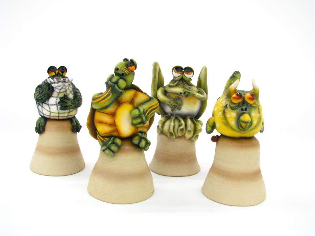 Todd Warner Dinner Bell Sculptures: Group of four Todd Warner 7" to 8" high dinner bell sculptures including Turtle, Alligator, Frog and Fish, each pencil signed and dated '98 and or '2000