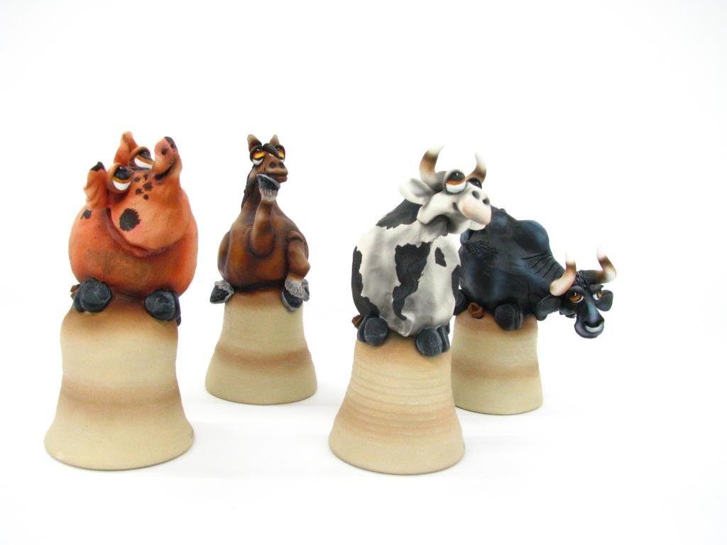 Todd Warner Dinner Bell Sculptures: Group of four Todd Warner Dinner Bell Sculptures including two cows, horse and pig, 7" to 8.5" high, each signed and dated '97 to 2000