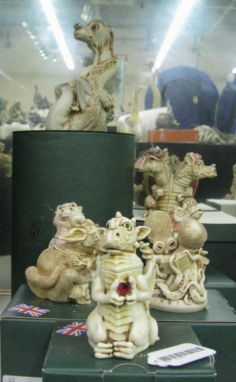 Group of Harmony Kingdom Figurines: A group of seven Harmony Kingdom Figurines including "Rhapsody in Blue"; "Baldwin's Twain", 121/2400; "Tamira's Treasure", 342/3600; "Cantito"; "Rubicon"; "Rufus", 286/5000; "Grisaille"; all with orig