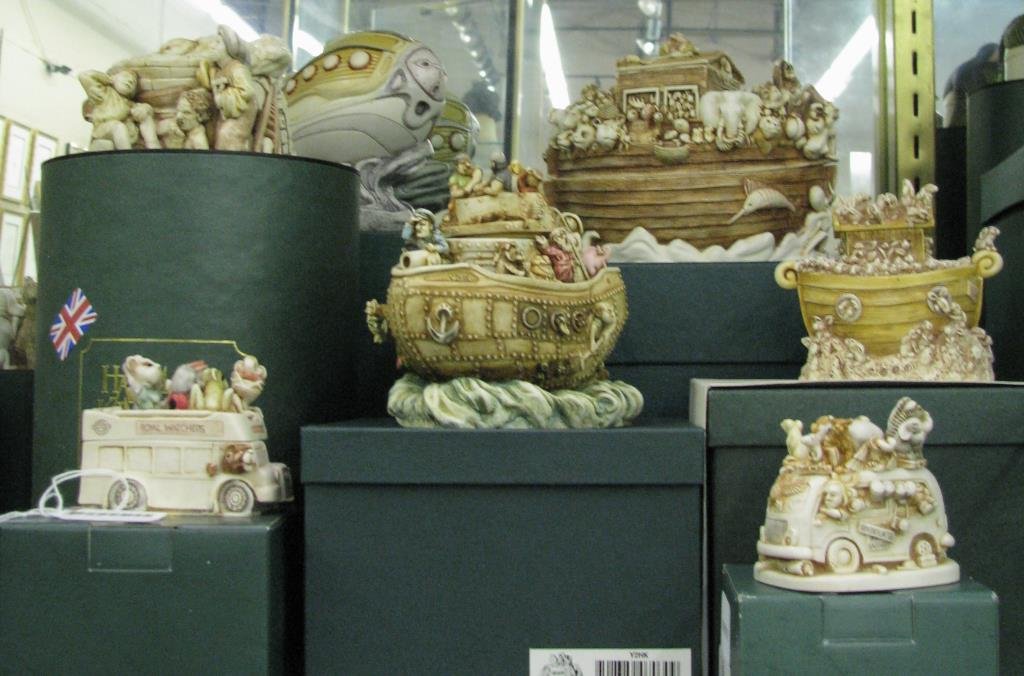 Group of Harmony Kingdom Figurines: A group of seven Harmony Kingdom figurines including "Babbling Heights"; "Noah's Quark"; "Noah's Lark", 4815/5000; "Magic Bus"; "Infinity"; "Y2HK"; "Peter's Rabbits", 121/2400; all with original boxes