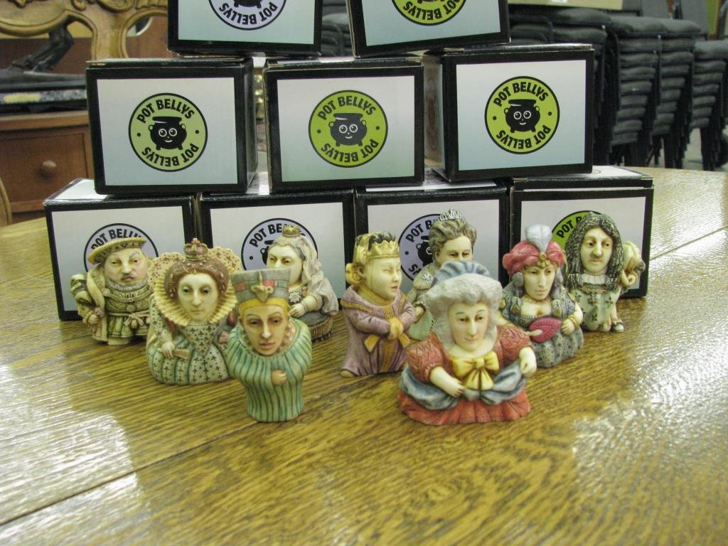 Group of Pot Belly Figures: A group of nine Pot Belly figures depicting historic and royal figures including Marie Antoinette, Queen Elizabeth, King Arthur, etc.