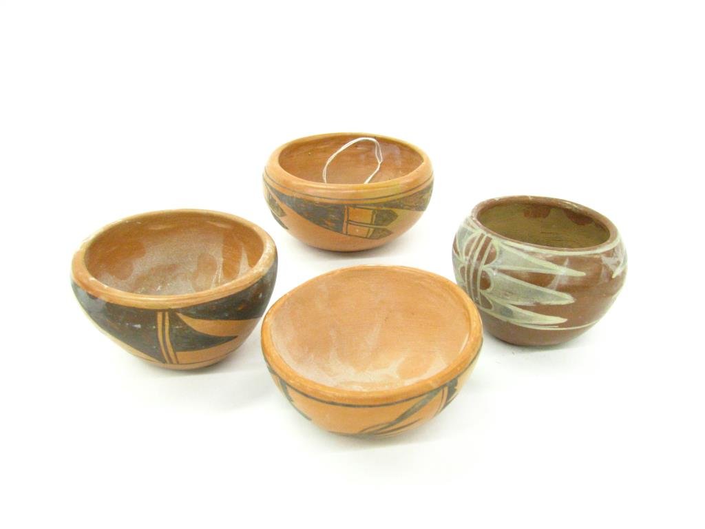 Four Southwestern Pottery Bowls: Four Southwestern pottery bowls, Redware, with polychrome decoration, 4" to 5" diameter, all unmarked