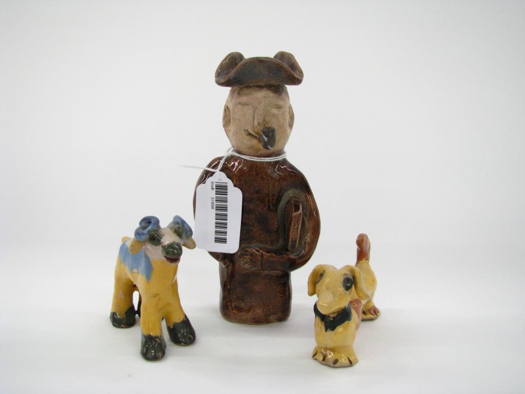 Two Overbeck Pottery Animals, Unmarked Figure: Two Overbeck Pottery animal figures, plus an unmarked figure, including 3.75" long Dachshund, and 3" high goat figure, both with Overbeck mark on foot, and an unmarked 6" pottery figure of man smoking