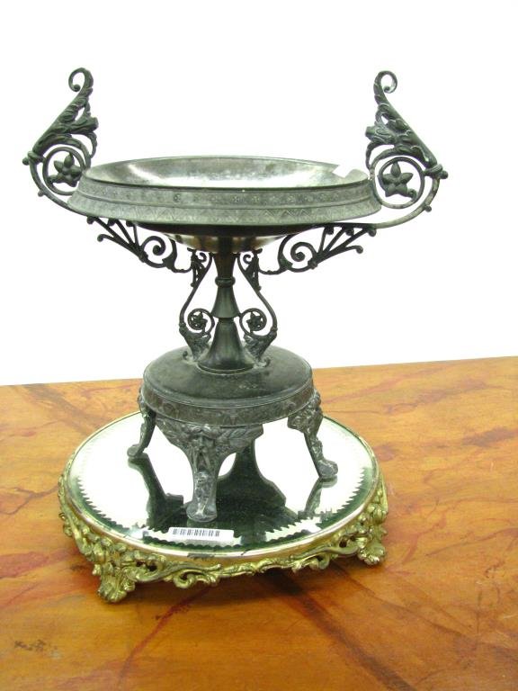 Mirrored Plateau, Silver Compote: Two items, including a Manhattan triple plate ornate footed compote, and a mirrored dresser plateau with gilded metal footed base