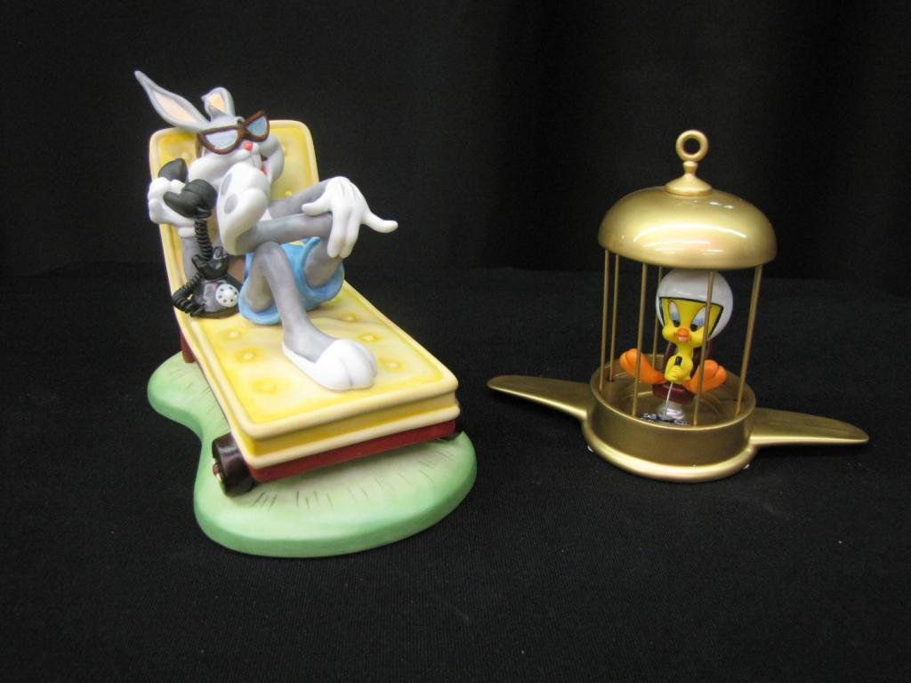 Two Warner Bros. Porcelain Figurines: Two Warner Bros. Porcelain Figurines including: "The only Way to Fly" (#364/10,000) without original box, "Hollywood Hare" (#975/2500) with original box, 5-6" tall