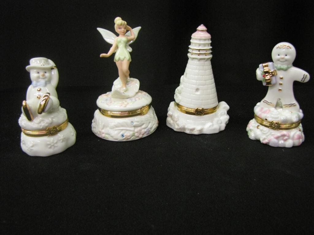 Four Lenox Treasure Box Figurines: Four Lenox Treasure Box Figurines including: "Tinkerbell Anniversary" , "A sweet Surprise" Gingerbread box, "The Light in the Harbor", "The Skating Adventure", 4-5" tall, with original boxes