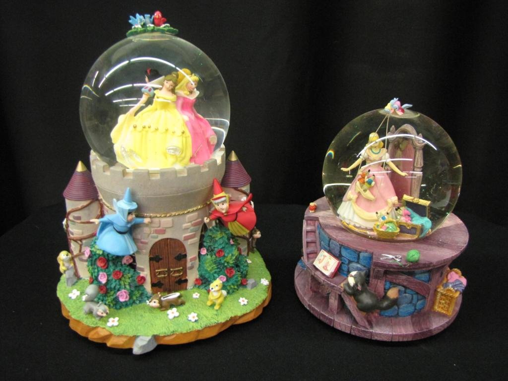 Two Disney Snow Globes: Two Disney Snow Globes including: Disney Princesses (with original box) and Cinderella (without original box), 7-9" tall
