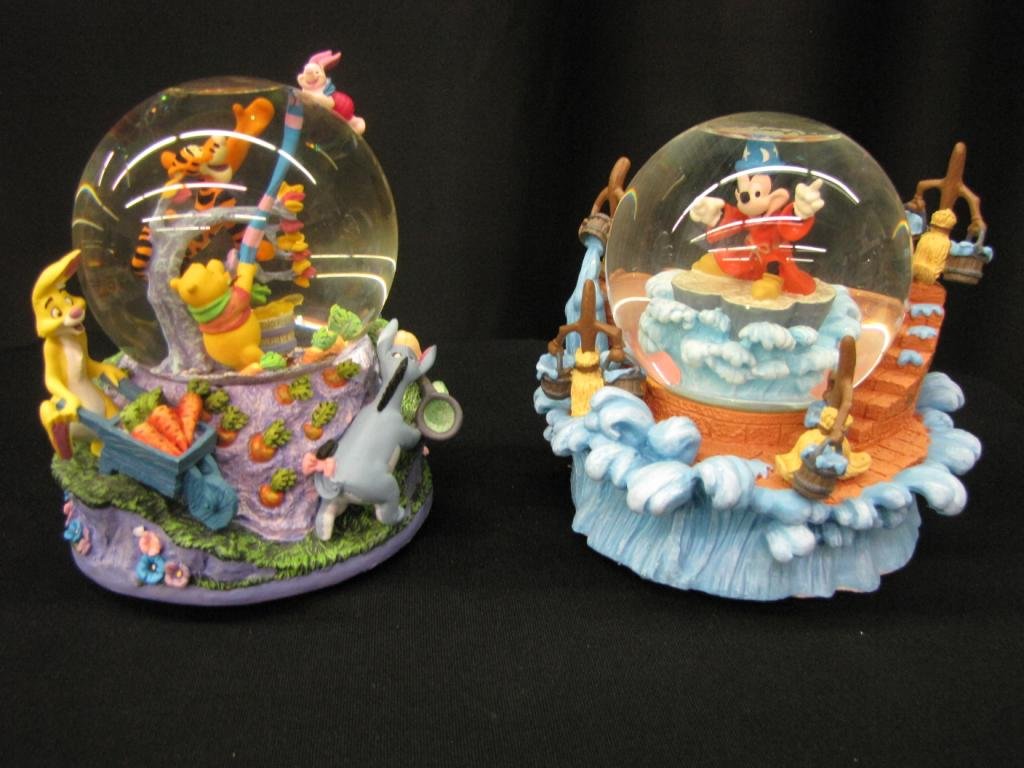 Two Disney Snow Globes: Two Disney Snow Globes featuring Mickey's Fantasia and Pooh and Friends, 6-7" tall with original Boxes