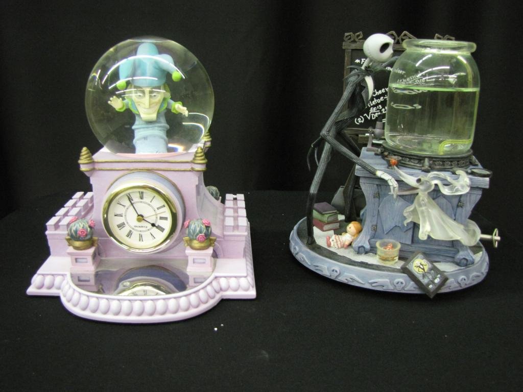 Two Disney Snow Globes: Two Disney Snow Globes depicting a scene from Fantasia, and one depicting Jack from a Nightmare Before Christmas, 9" tall, with original boxes