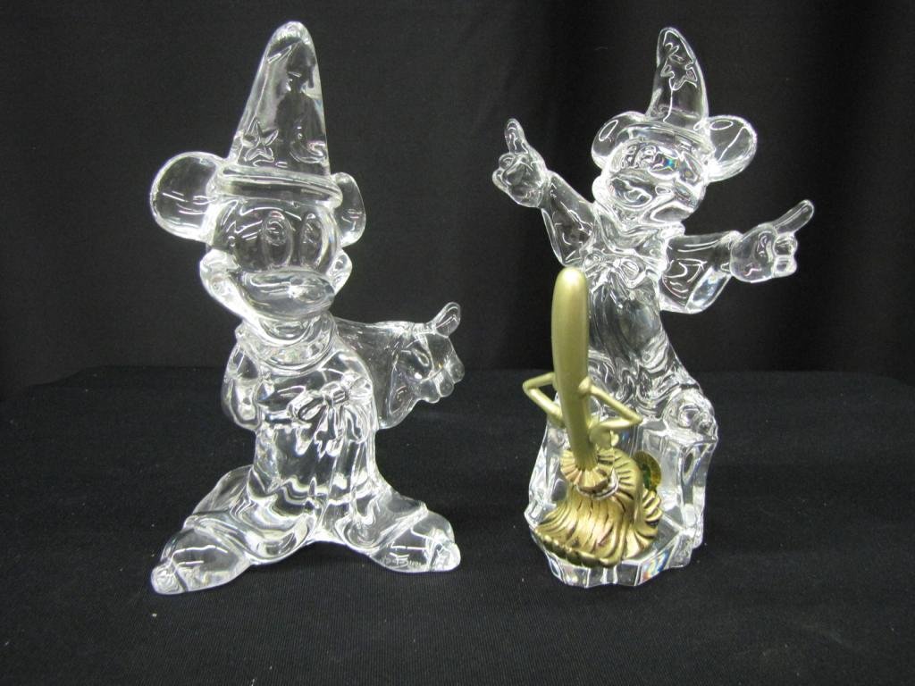 Two Disney Crystal Figurines: Two Disney Crystal Figurines depicting Sorcerer's Apprentice from Fantasia and Mickey in apprentice attire, 9" tall, with original box